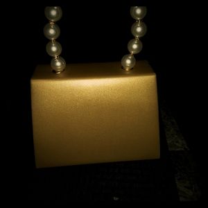 Gold evening purse